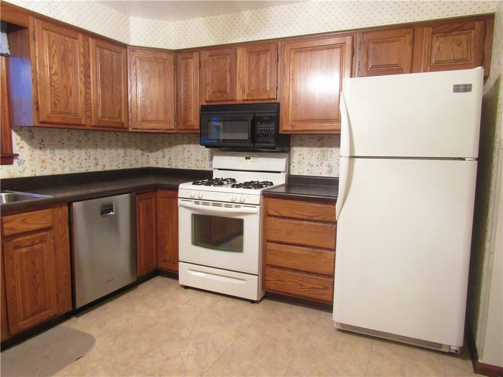 3116 Middletown Road Pittsburgh, PA 15204 - Photo 5 of 24 Kitchen has the Dishwasher, Gas Stove, Microwave Oven, and Refrigerator