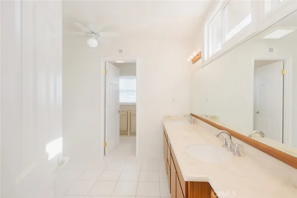 a view of a kitchen with furniture and an entryway