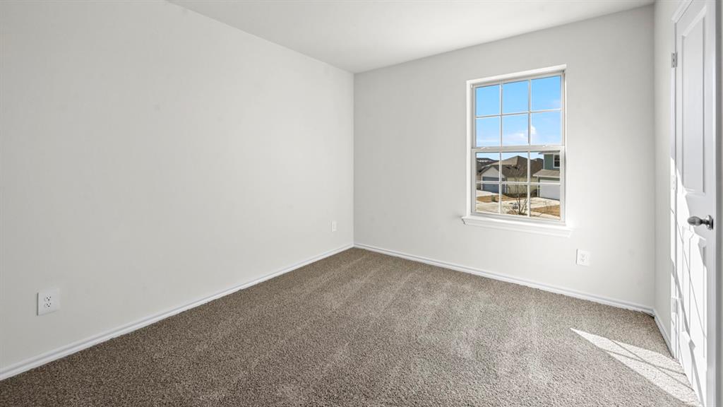 3343 Spaulding Drive Paris, TX 75460 - Photo 15 of 35 an empty room with windows