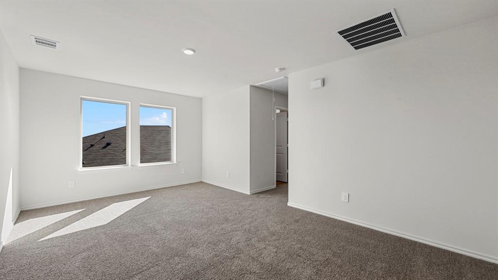 3343 Spaulding Drive Paris, TX 75460 - Photo 17 of 35 a view of an empty room with a window