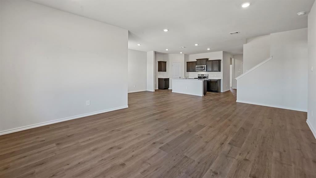 3343 Spaulding Drive Paris, TX 75460 - Photo 31 of 35 a view of a kitchen with a sink and wooden floor