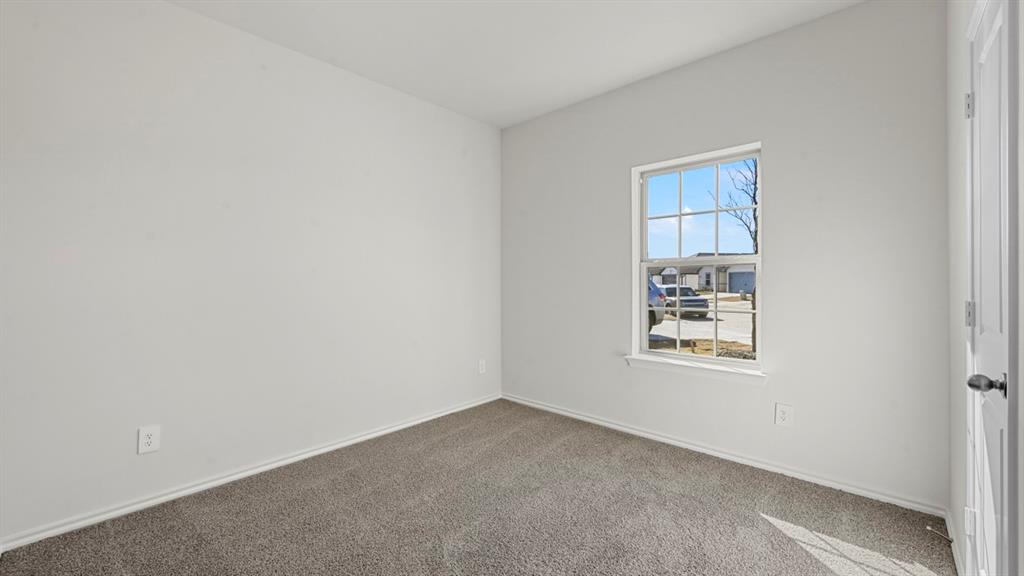 3343 Spaulding Drive Paris, TX 75460 - Photo 7 of 35 an empty room with windows