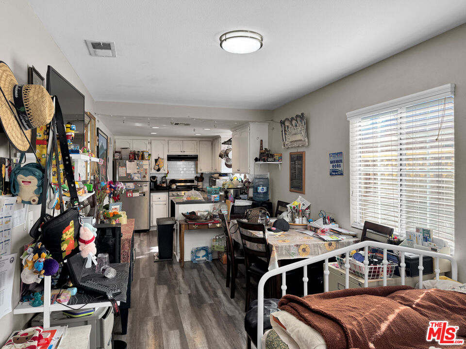 13258 Filmore Street Pacoima, CA 91331 - Photo 7 of 30 a view of a dining room with furniture window and outside view