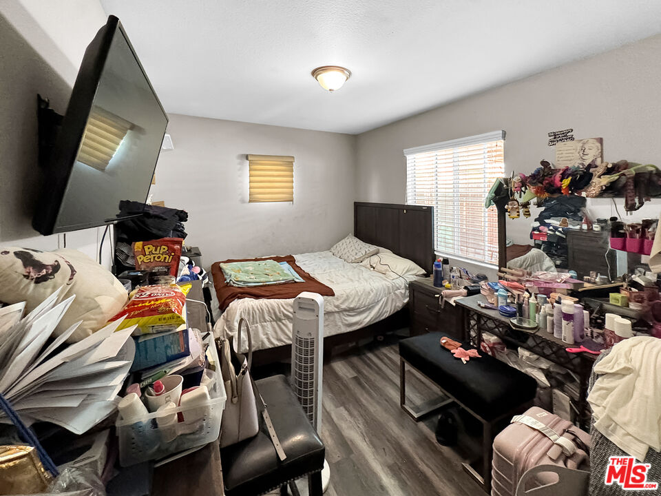 13258 Filmore Street Pacoima, CA 91331 - Photo 10 of 30 a view of a livingroom with furniture and a flat screen tv