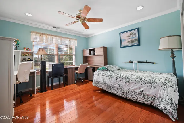 an aerial view of a house with outdoor space