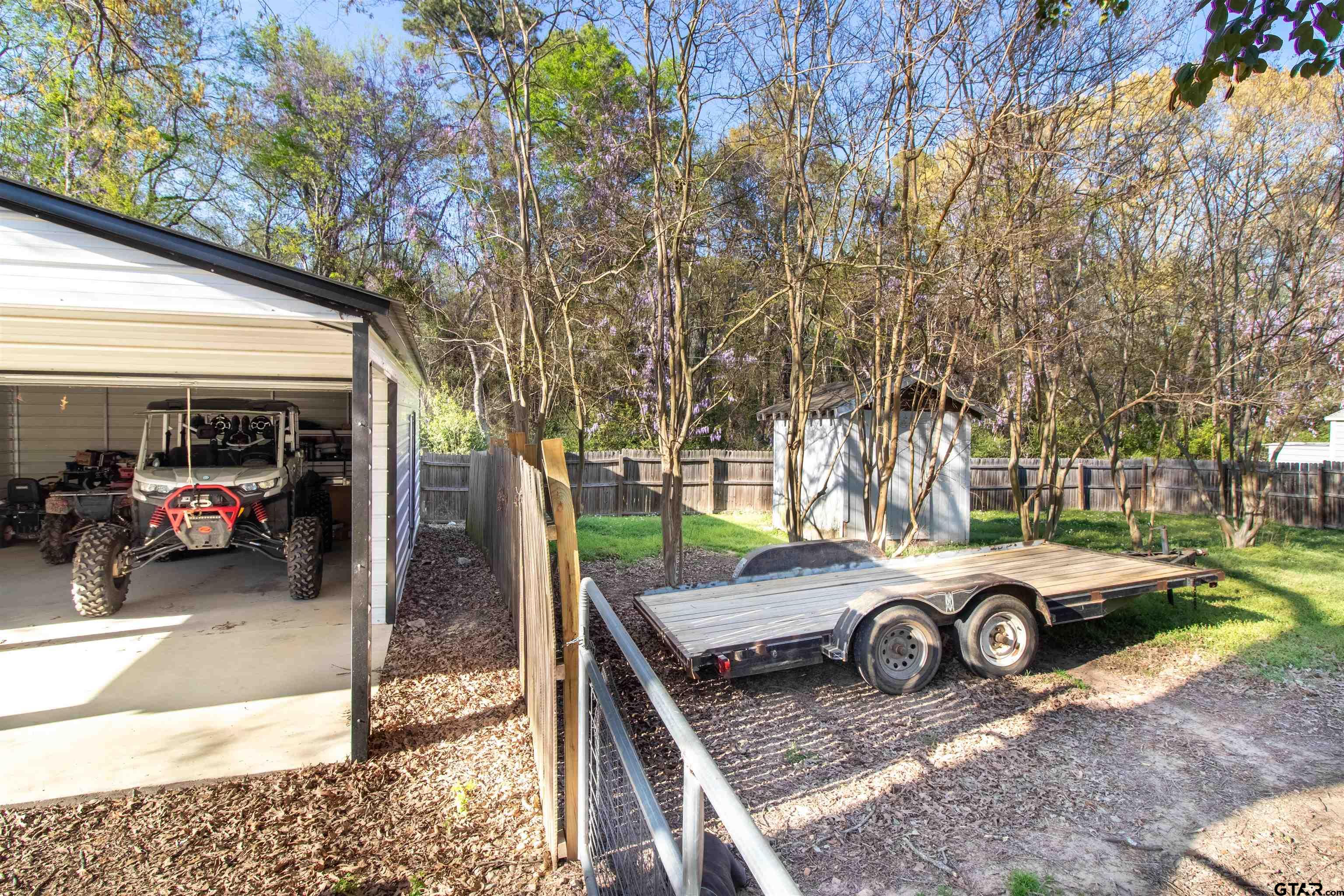 513 Lance Road Quitman, TX 75783 - Photo 25 of 27 a car parked in front of a house