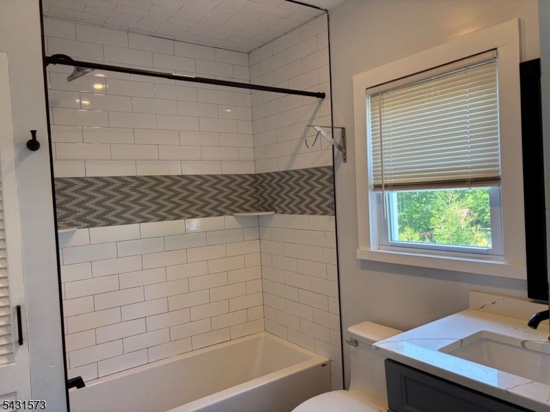 358 Woodland Road, Unit 2 Madison, NJ 07940 - Photo 20 of 50 a bathroom with a bathtub and shower