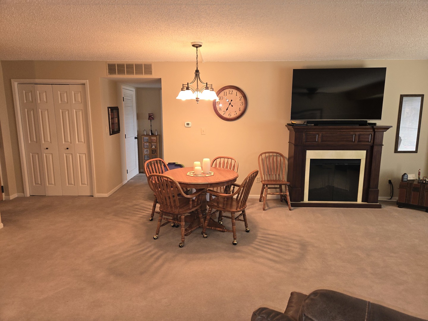 1133 North 7th Street, Unit 802 Rochelle, IL 61068 - Photo 4 of 12 a view of a livingroom with furniture and a fireplace