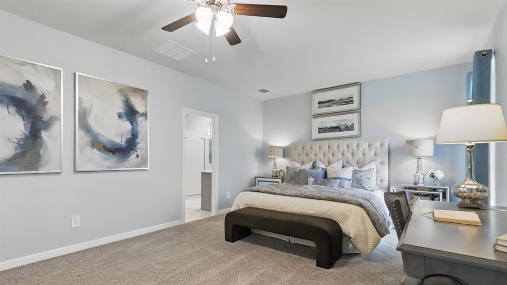 9708 Austin Holw Road Fort Worth, TX 76036 - Photo 16 of 35 a bedroom with bed and a chandelier