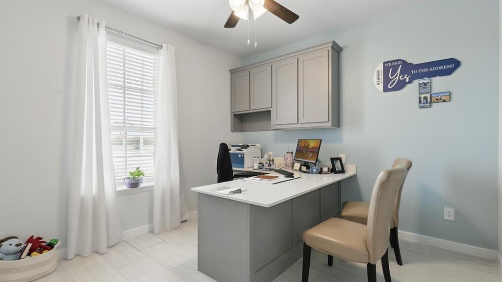 9708 Austin Holw Road Fort Worth, TX 76036 - Photo 31 of 35 a kitchen that has a cabinets counter space and appliances