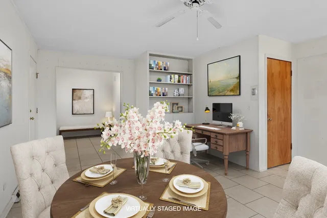 a kitchen with cabinets appliances a sink and a counter top