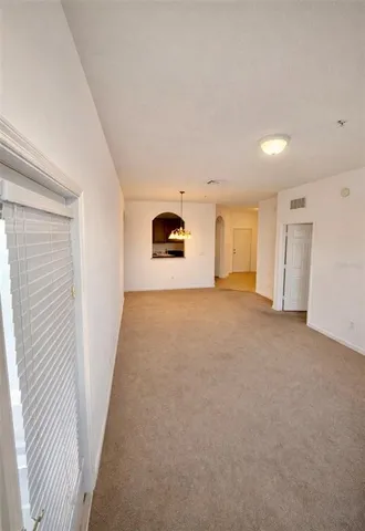 a view of a livingroom with a staircase