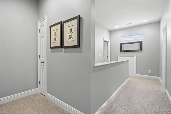 a bedroom with a bed and a cabinets