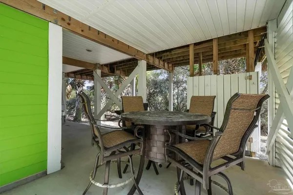 a picture of a bench in front of a door