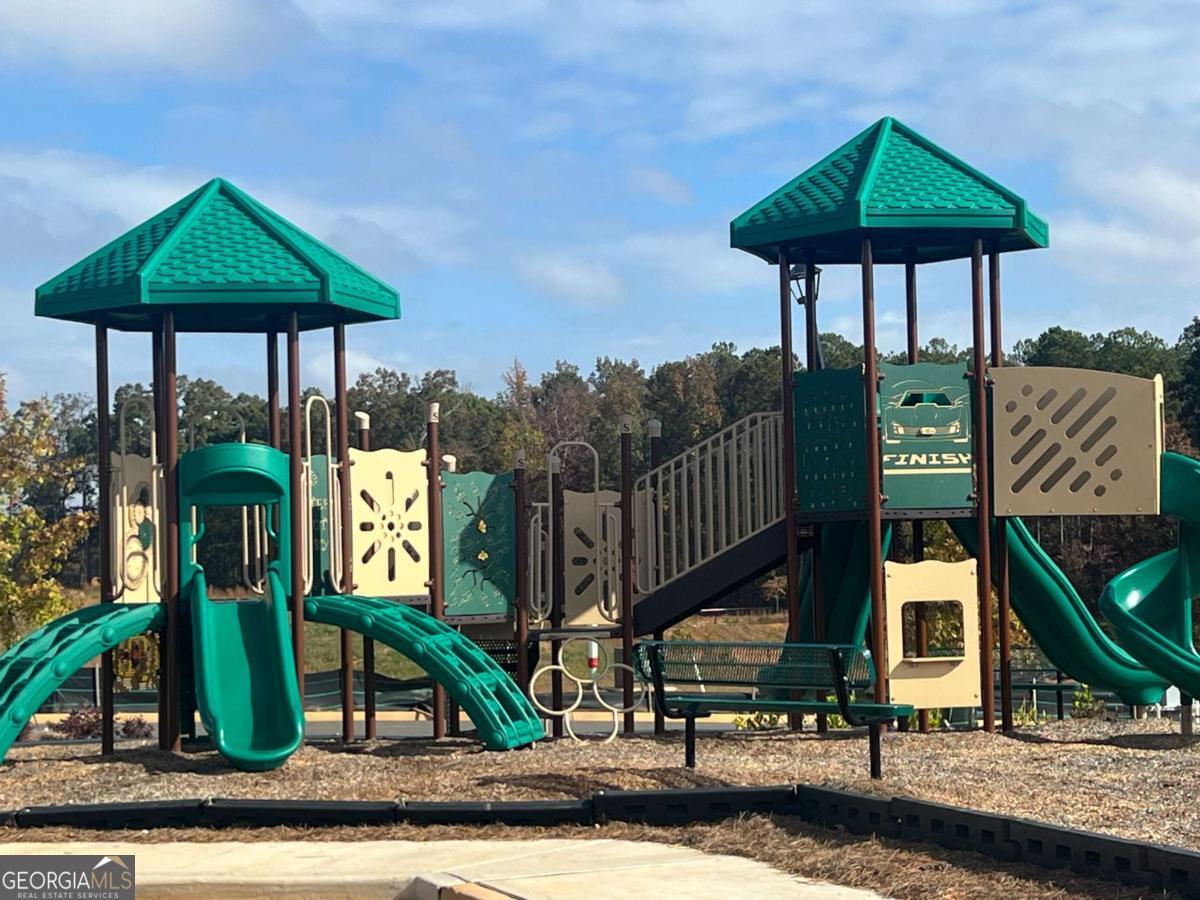 350 Jarrette Street, Unit 54 Fairburn, GA 30213 - Photo 3 of 11 a front view of a house
