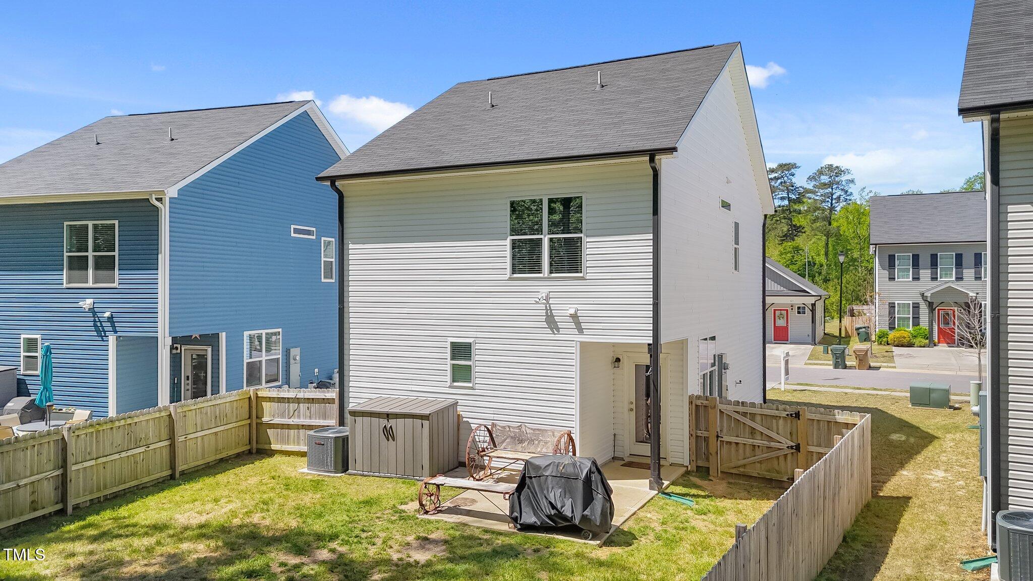 166 Yellow Jacket Ridge Clayton, NC 27520 - Photo 30 of 39 a view of house with swimming pool and furniture