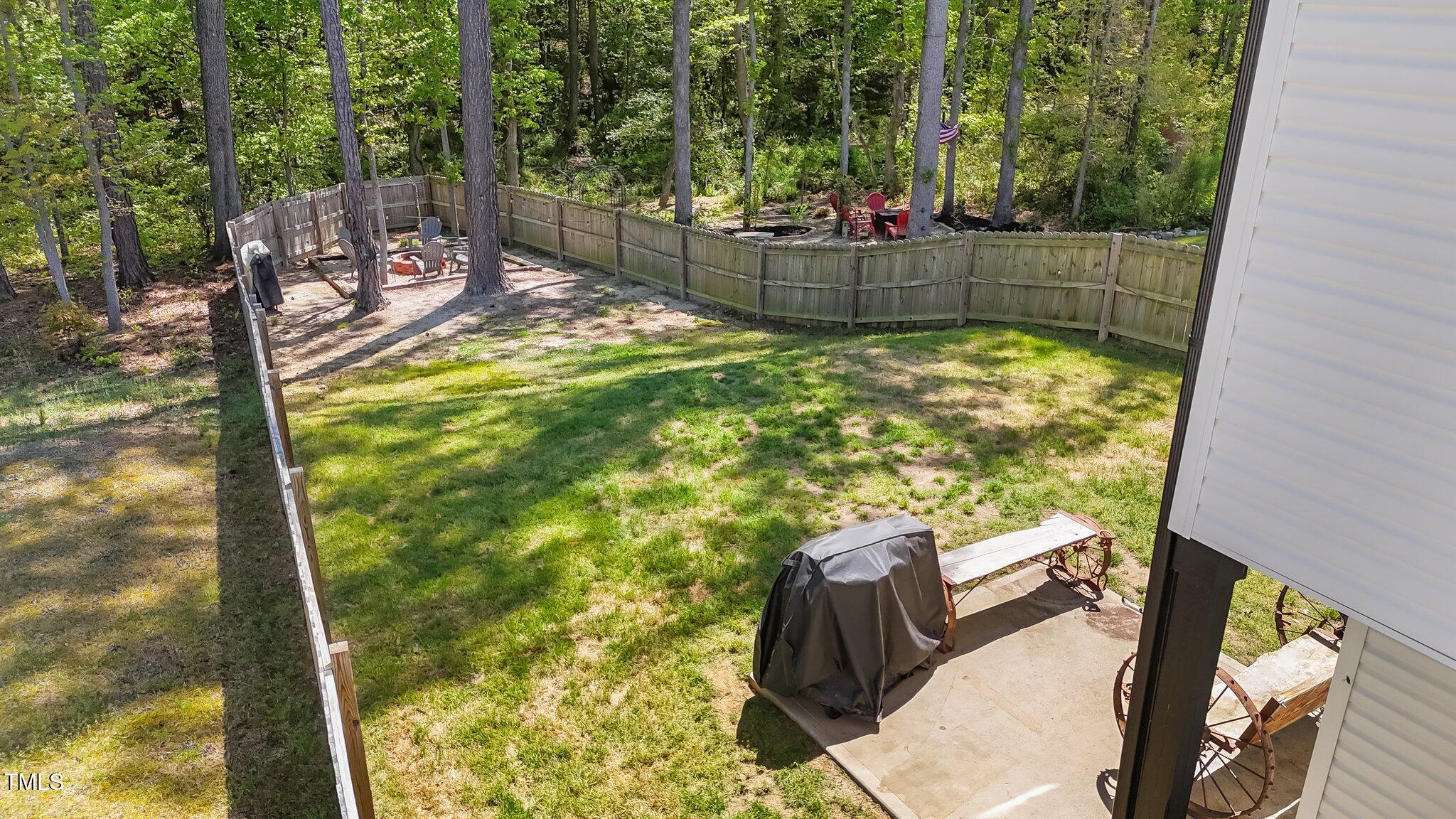 166 Yellow Jacket Ridge Clayton, NC 27520 - Photo 32 of 39 a view of a backyard