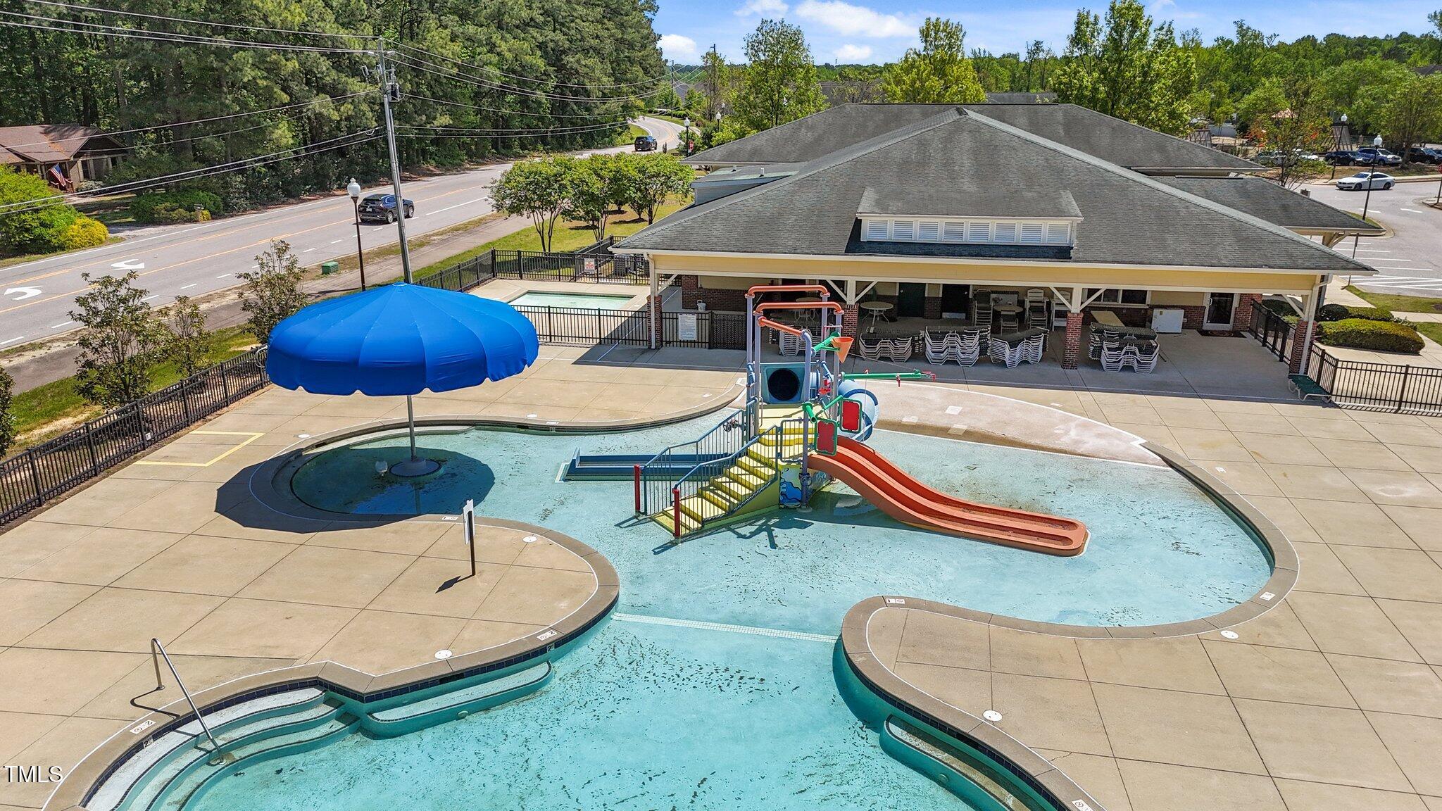 166 Yellow Jacket Ridge Clayton, NC 27520 - Photo 38 of 39 an aerial view of a house roof deck and patio