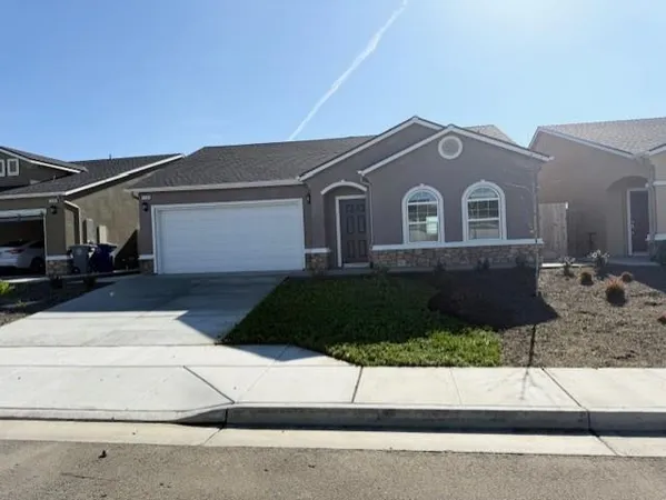 a house view with a outdoor space