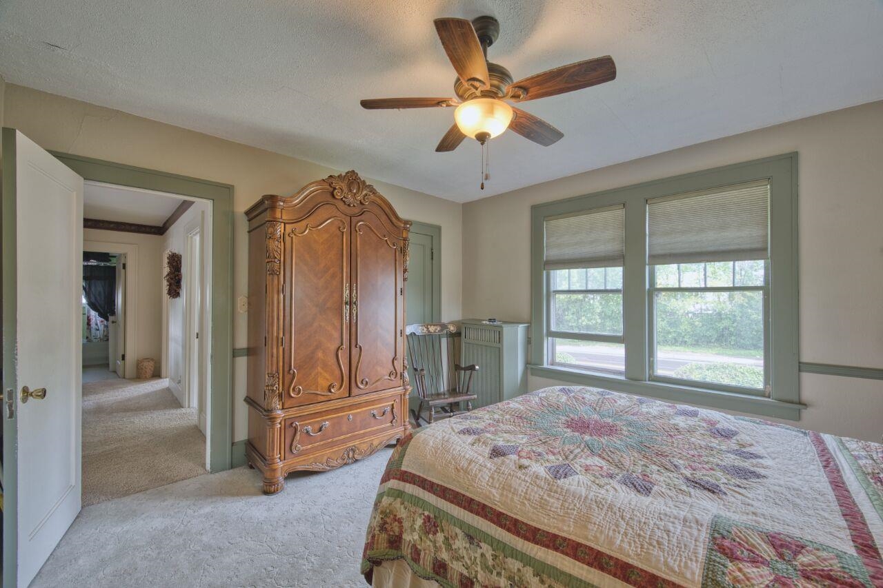 701 Grant Avenue Eveleth, MN 55734 - Photo 22 of 50 Carpeted bedroom with ceiling fan