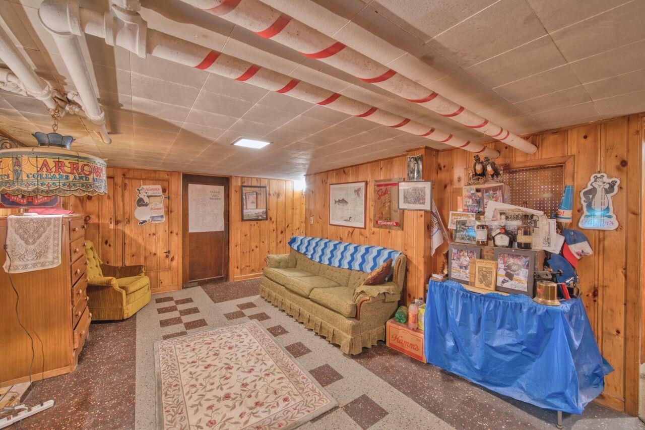 701 Grant Avenue Eveleth, MN 55734 - Photo 36 of 50 Living area with wooden walls