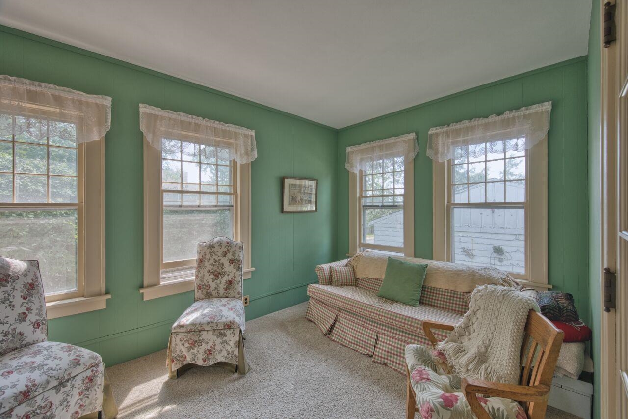 701 Grant Avenue Eveleth, MN 55734 - Photo 9 of 50 Sitting room featuring carpet floors and healthy amount of natural light