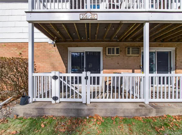 a view of a house with porch and deck