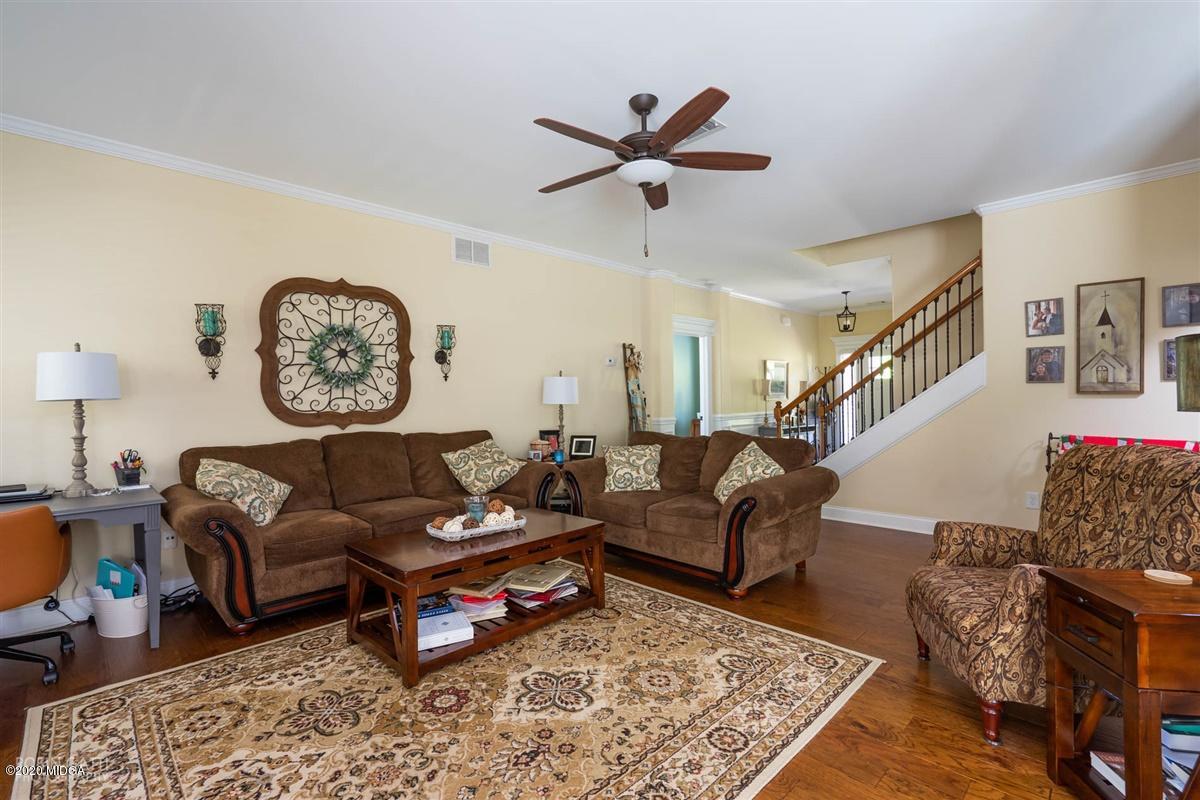 20 Laurel Ridge Forsyth, GA 31029 - Photo 14 of 34 a living room with furniture and a rug