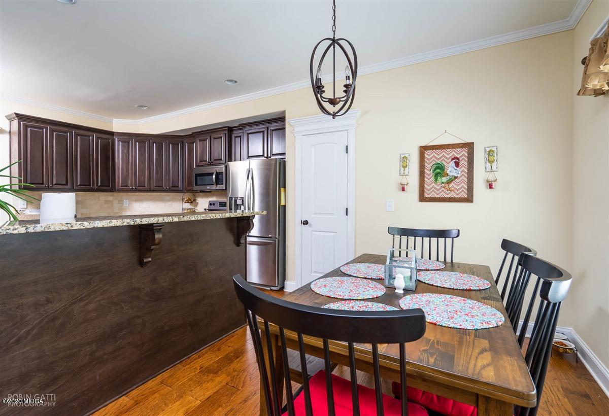 20 Laurel Ridge Forsyth, GA 31029 - Photo 15 of 34 a view of a dining room with furniture