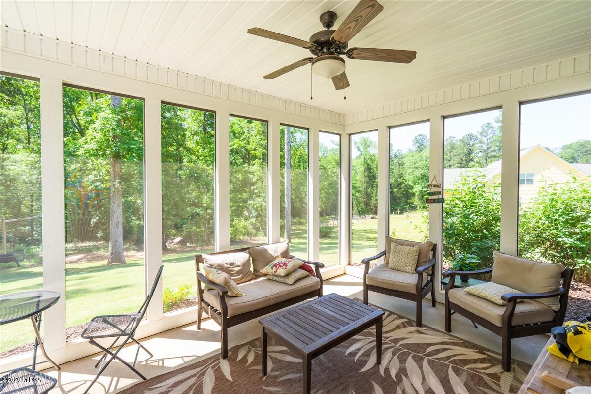 20 Laurel Ridge Forsyth, GA 31029 - Photo 30 of 34 a living room with furniture and a large window