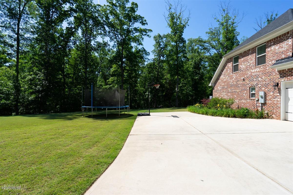 20 Laurel Ridge Forsyth, GA 31029 - Photo 4 of 34 a view of backyard with green space