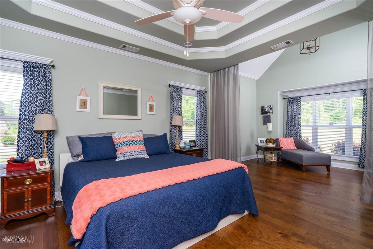 20 Laurel Ridge Forsyth, GA 31029 - Photo 7 of 34 a bedroom with bed and wooden floor