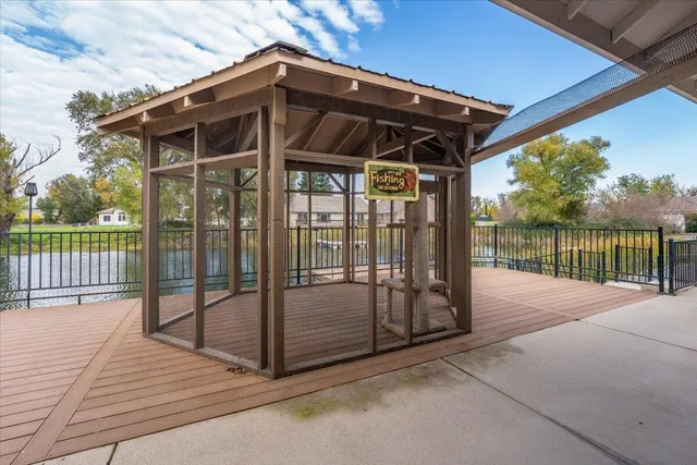a view of a house with a door and wooden floor