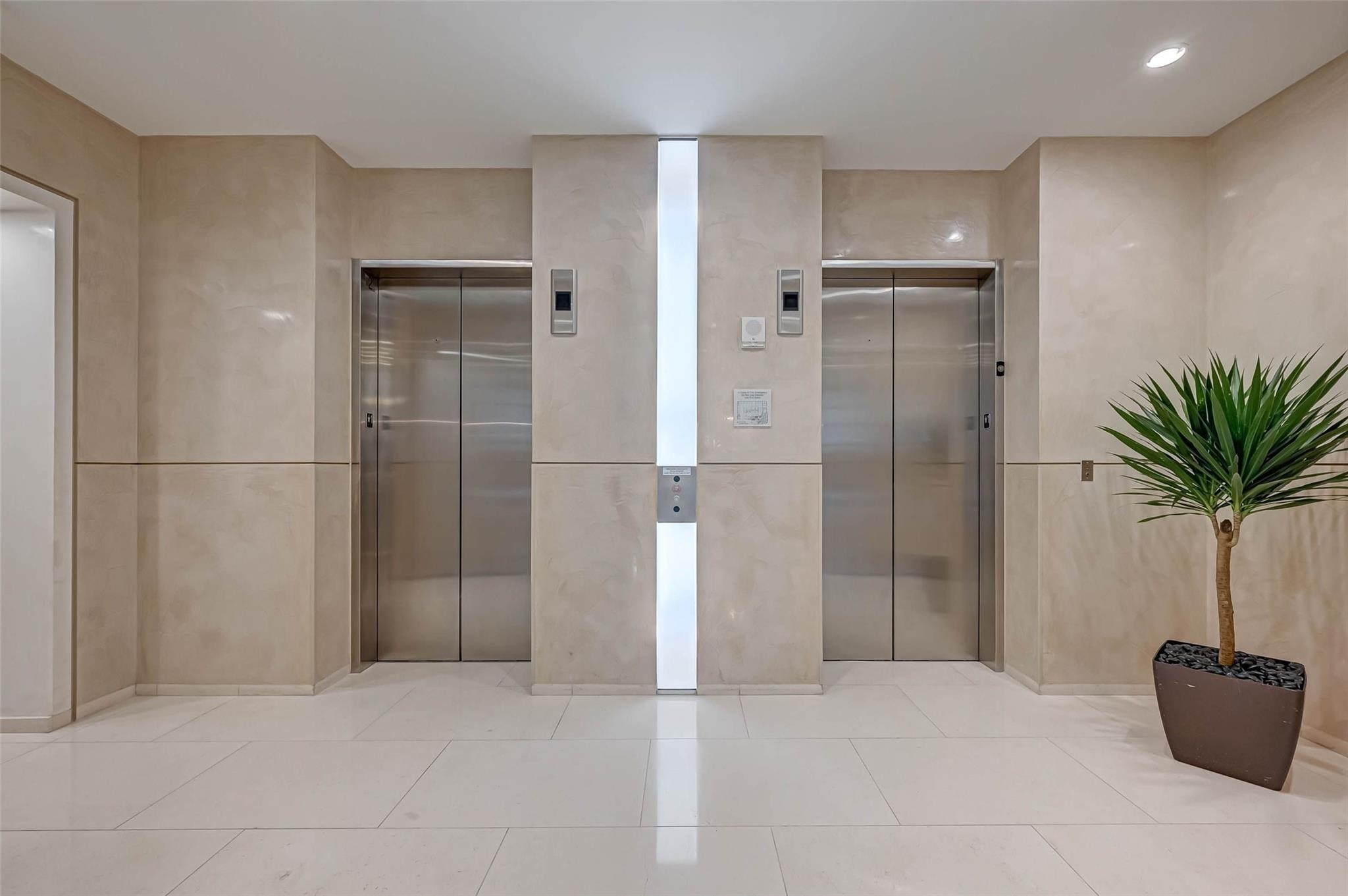 2207 Bancroft Lane, Unit 1202 Houston, TX 77027 - Photo 21 of 47 a bathroom with a shower and a potted plant