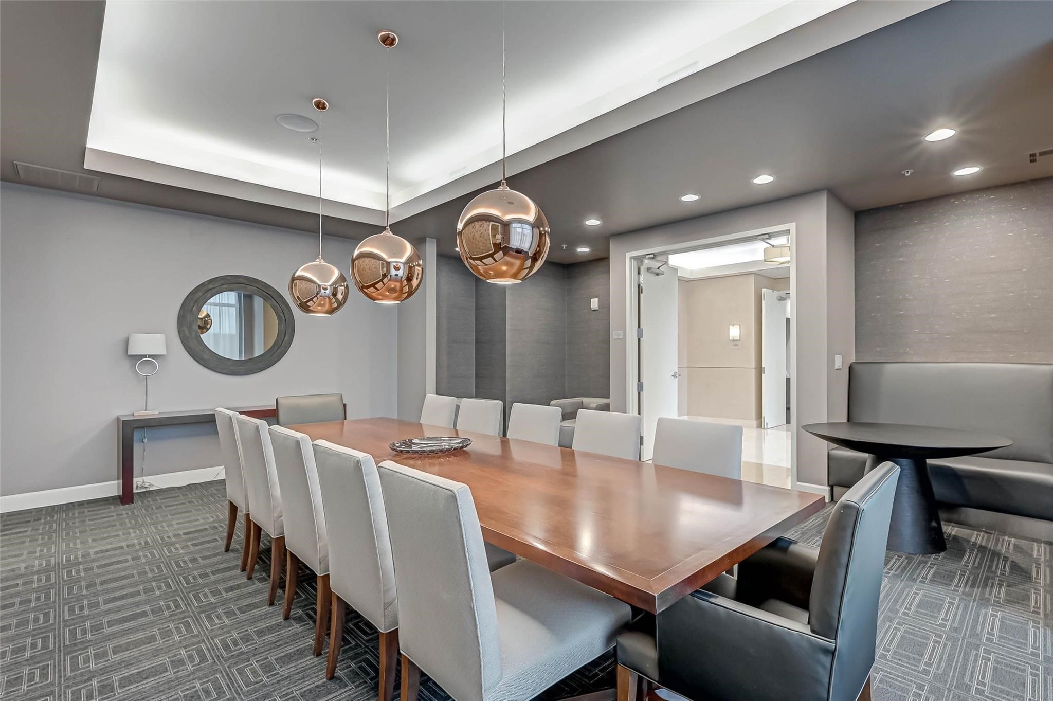 2207 Bancroft Lane, Unit 1202 Houston, TX 77027 - Photo 27 of 47 a view of a dining room with furniture and wooden floor