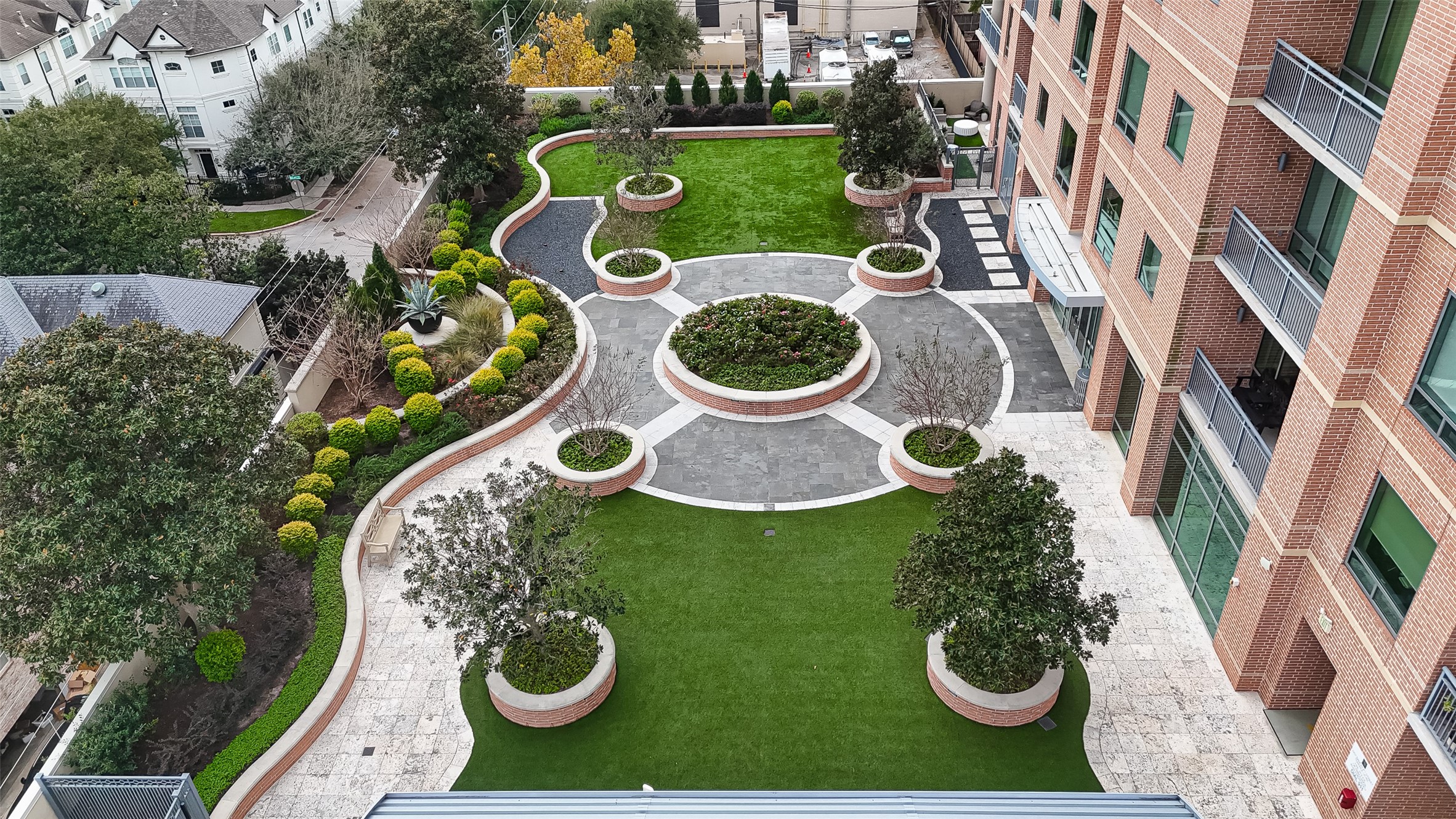 2207 Bancroft Lane, Unit 1202 Houston, TX 77027 - Photo 40 of 47 an aerial view of residential house with outdoor space and parking