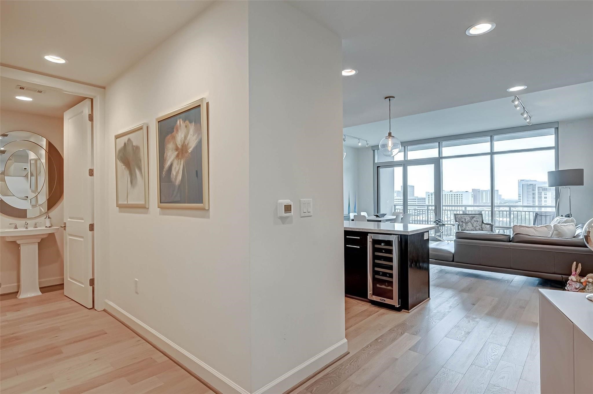 2207 Bancroft Lane, Unit 1202 Houston, TX 77027 - Photo 4 of 47 a view of a livingroom with furniture hardwood floor and floors