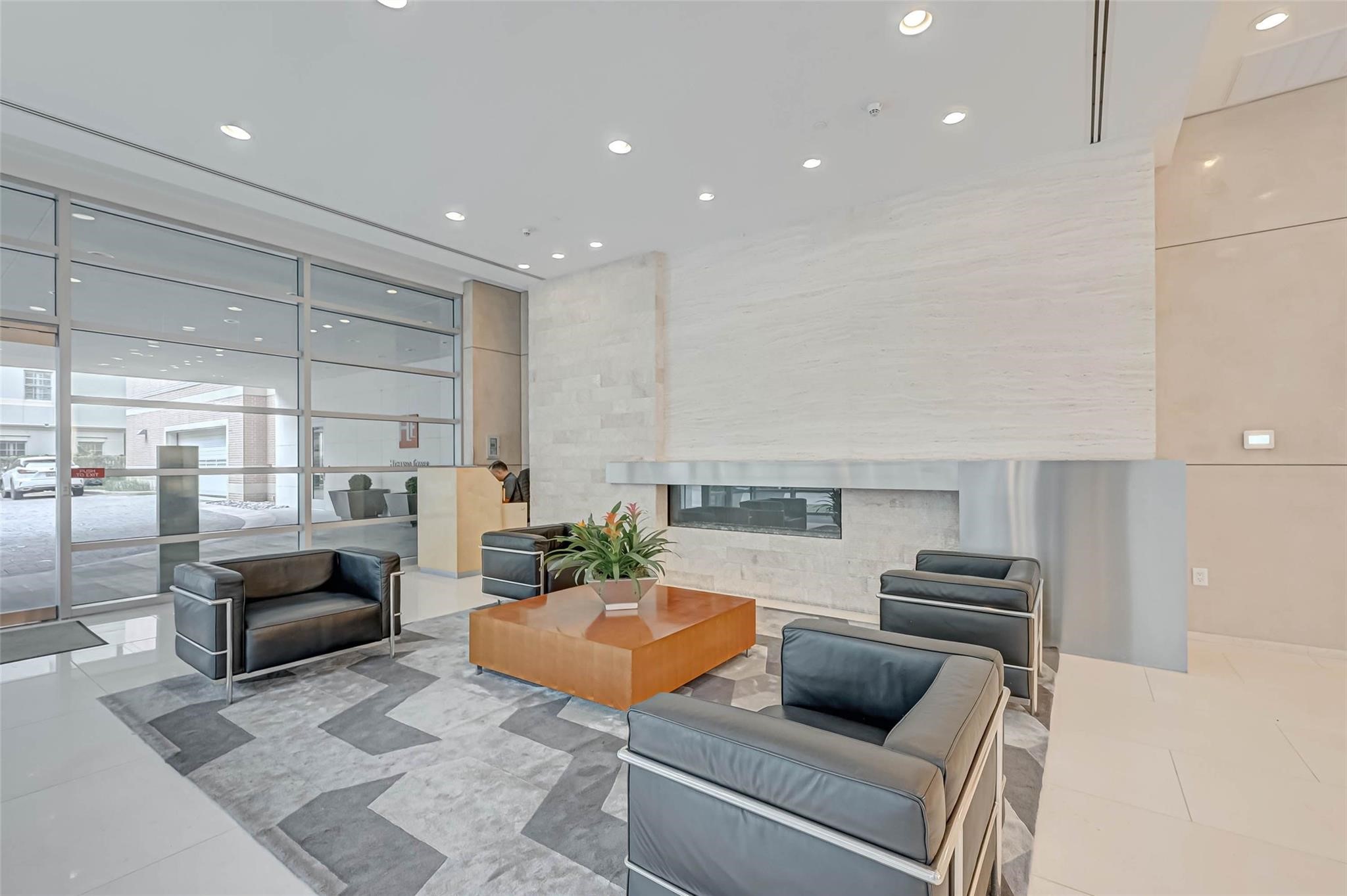 2207 Bancroft Lane, Unit 1202 Houston, TX 77027 - Photo 41 of 47 a living room with furniture and a rug