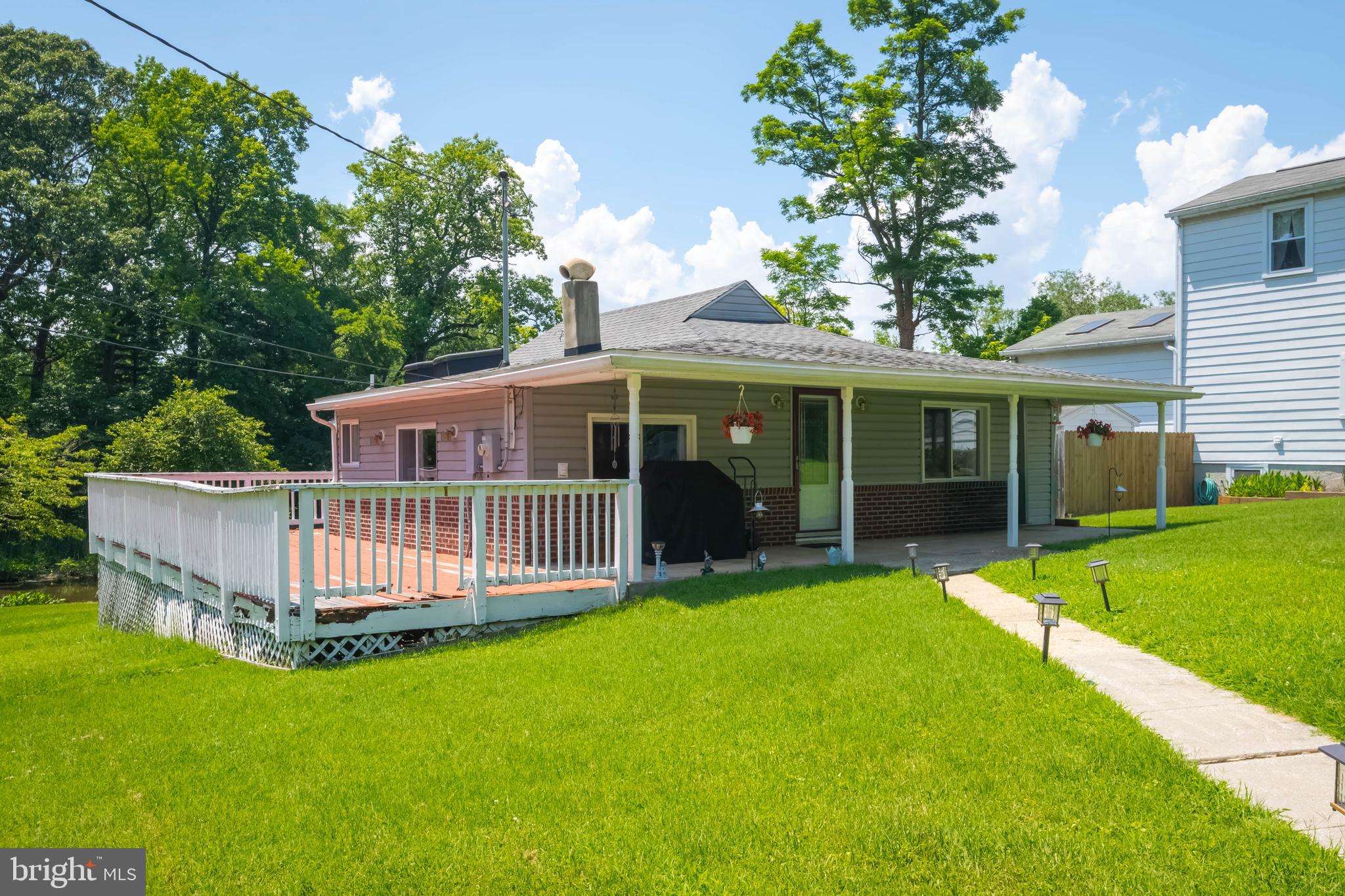 1006 Lourdes Road Baltimore, MD 21221 - Photo 1 of 43 a view of a house with a yard and deck
