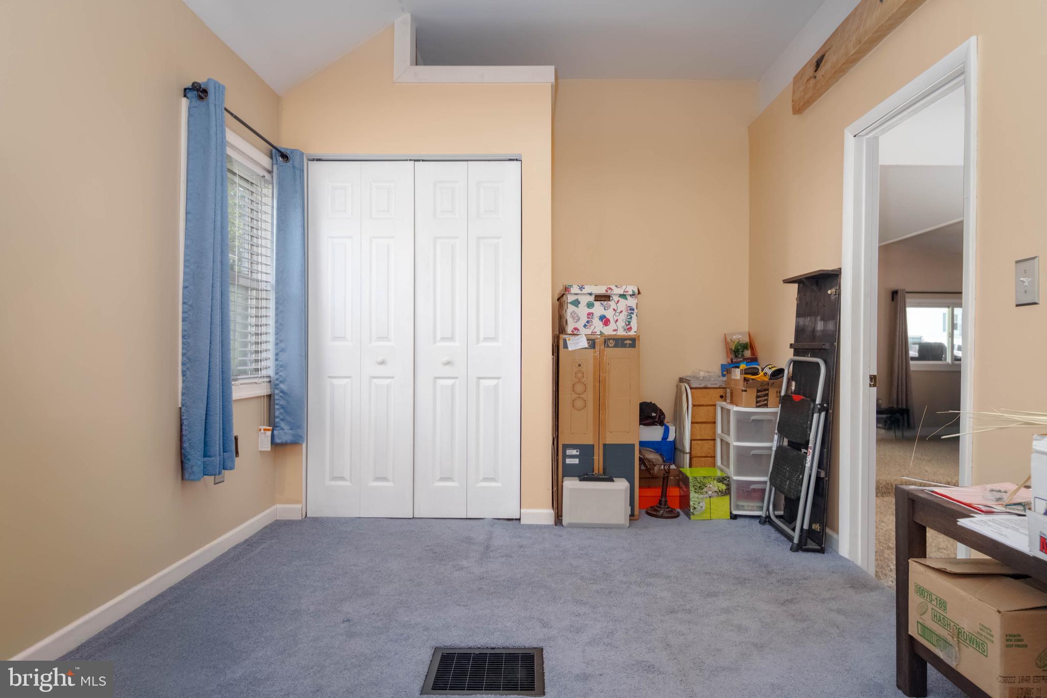 1006 Lourdes Road Baltimore, MD 21221 - Photo 21 of 43 a view of an empty room with a hallway