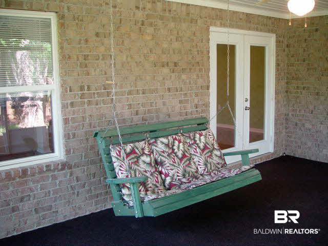 16752 Sugar Loop Foley, AL 36535 - Photo 24 of 34 Porch swing