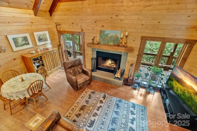 a open kitchen with a sink and dishwasher a oven with large windows