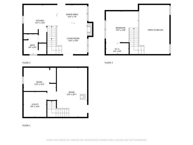 a bedroom with a bed and a lamp