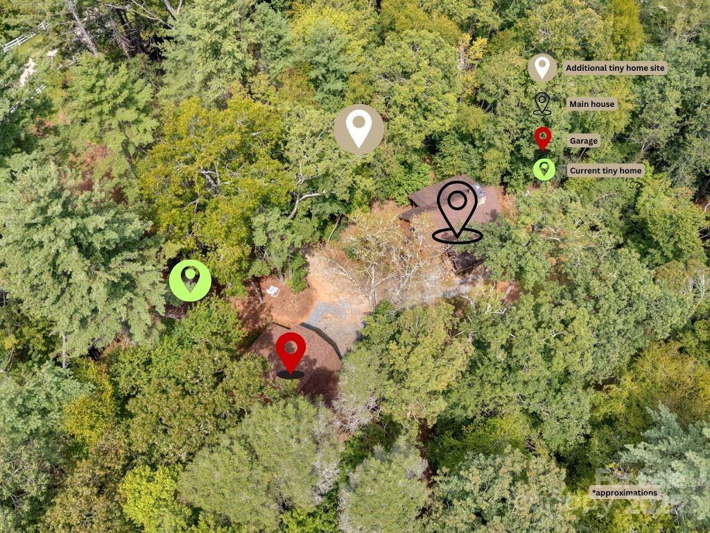 103 Mountain Laurel Road Pisgah Forest, NC 28768 - Photo 37 of 40 a view of outdoor space and front view of a house