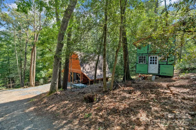 a backyard of a house with lots of green space