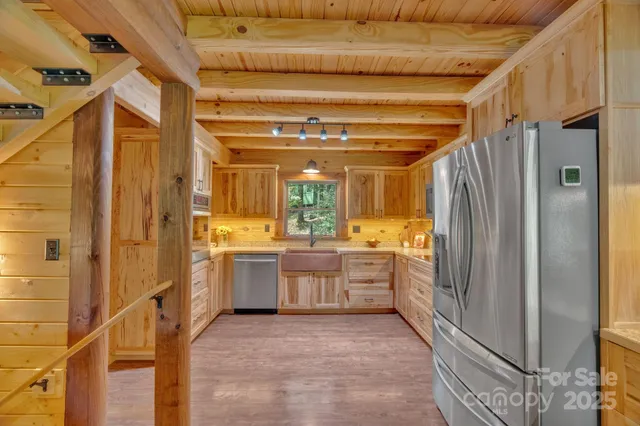 a large kitchen with a window