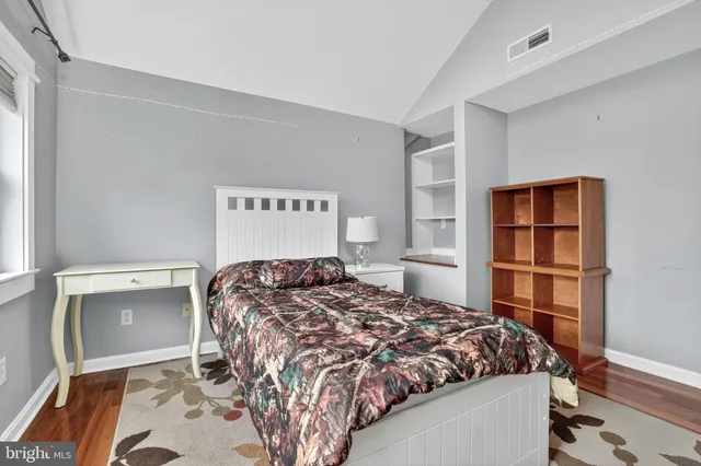 a bathroom with a bathtub and a toilet