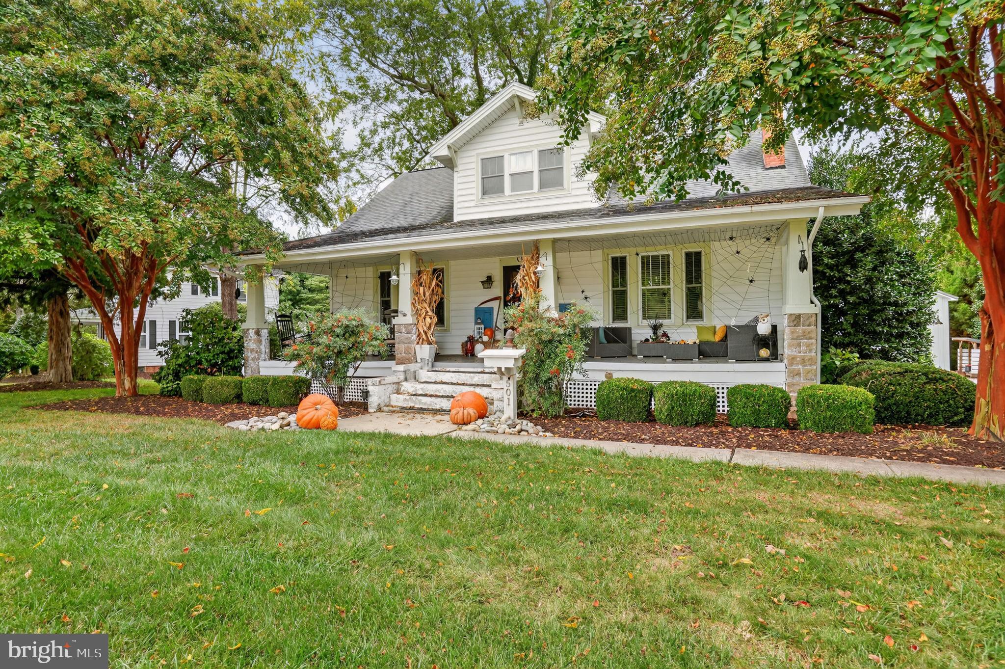 501 South Main Street Berlin, MD 21811 - Photo 3 of 75 a view of a house with a yard and sitting area