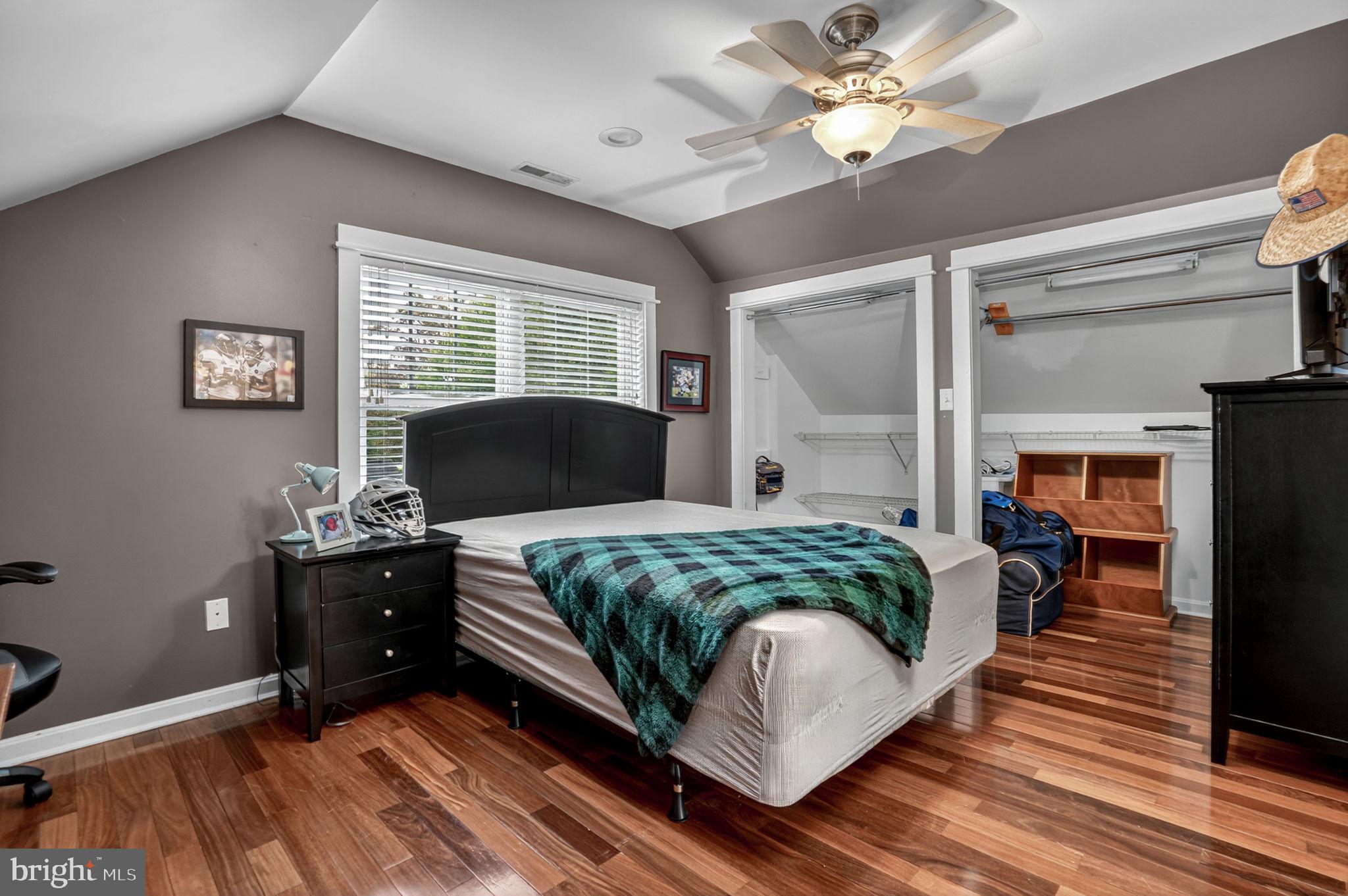 501 South Main Street Berlin, MD 21811 - Photo 42 of 75 a bedroom with a bed and window