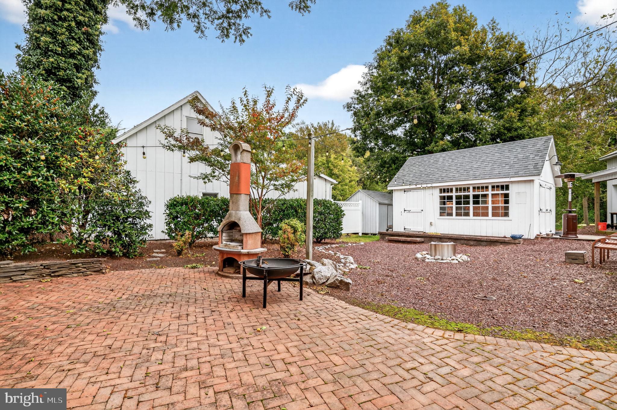 501 South Main Street Berlin, MD 21811 - Photo 54 of 75 a backyard of a house with outdoor seating